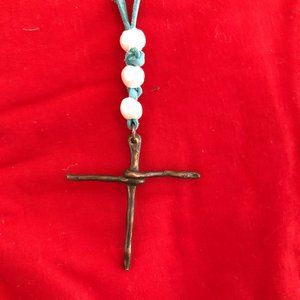 Handmade necklace bronze cross on suede cord with pearl beads